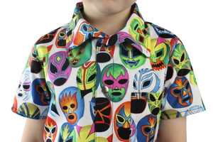 Close up of top on boy, Colorful masks on fabric 