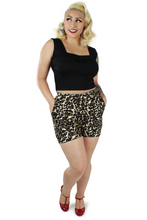 Load image into Gallery viewer, Model wearing leopard high waisted shorts 