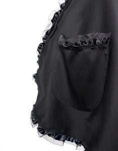 Close up of apron, black apron, large side pocket, trim detail 